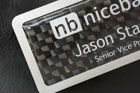 Corner Shot of Silver Pebbled Carbon Fiber Name Badge